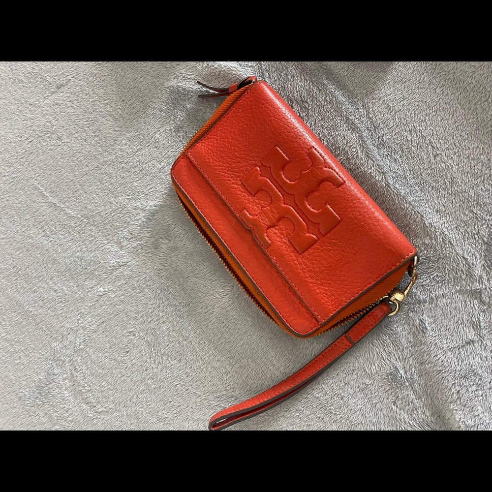 orange tory burch wristlet